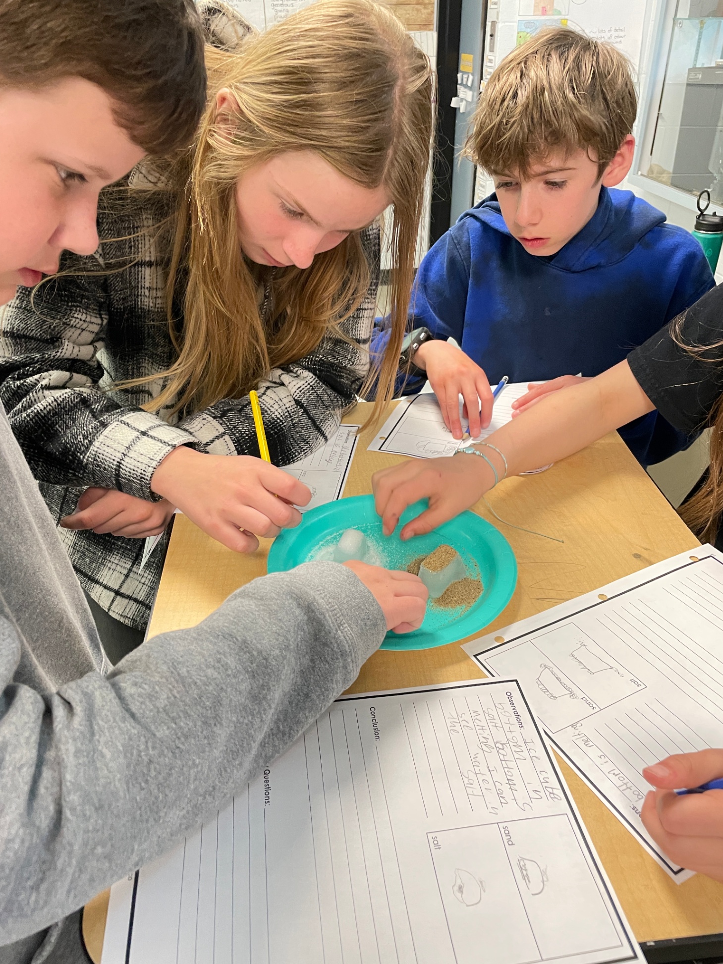 salt and sand on ice